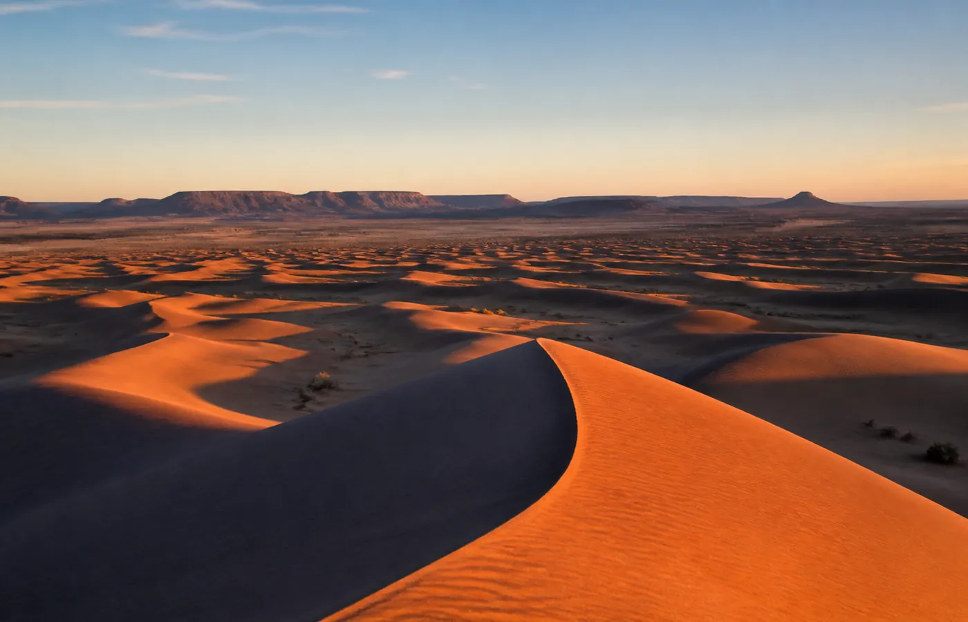 The wide golden dunes of Erg Chegaga stretching to the horizon